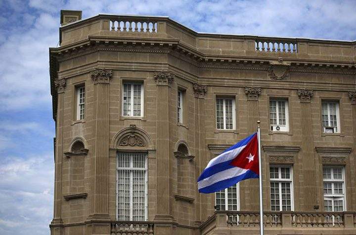 The Cuban national flag is seen raised over their embassy in Washington, DC, on July 20, 2015.    