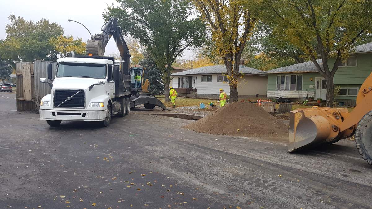 A City of Regina crew repairs  a water main on the 600 block of Dalgleish Drive. 