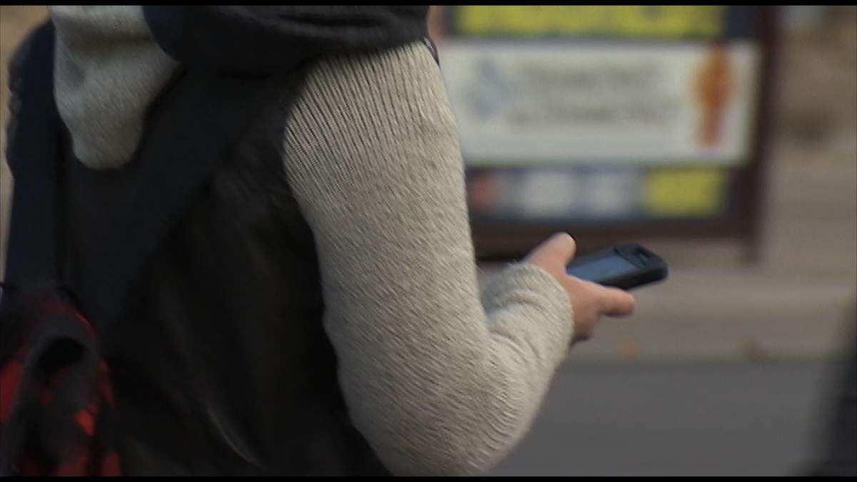 A file photo of a distracted pedestrian.