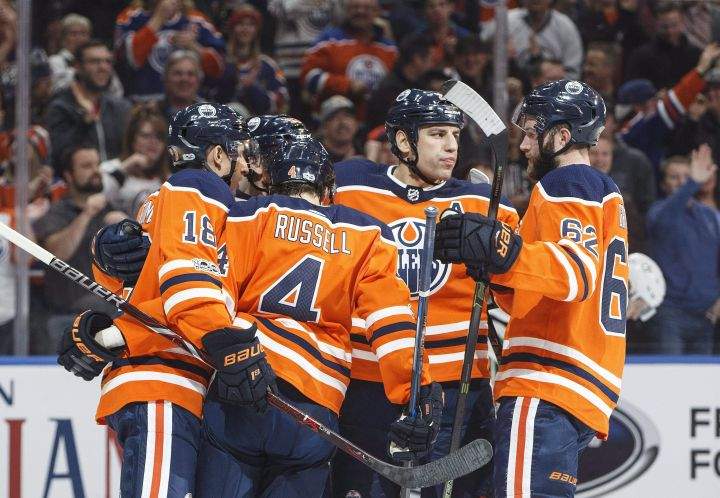 Edmonton Oilers players celebrate a goal against the Dallas Stars during second period NHL action in Edmonton, Alta., on Thursday October 26, 2017. 