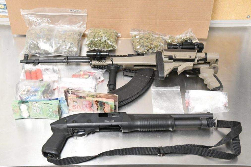 A house fire on Limberlost Road led to drugs and weapons charges against three Londoners.