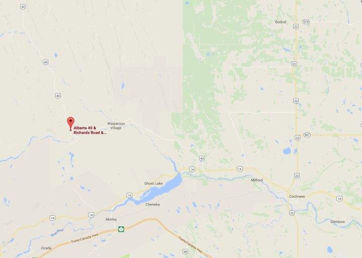 Crews were battling a fire west of Cochrane Wednesday. 