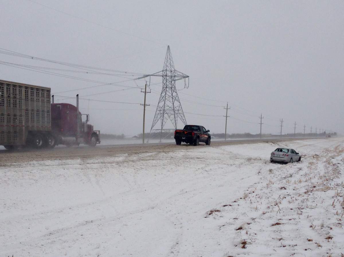 Icy roads and blowing winds are causing dangerous driving conditions and limited visibility on Highway 52.