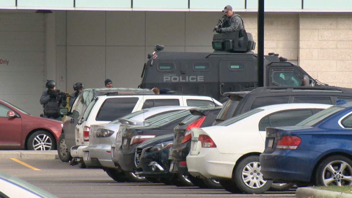 Calgary police respond to the Sheldon M. Chumir health centre in southwest Calgary on Thursday, Oct. 11, 2017 after a man was spotted inside a vehicle with a gun. 