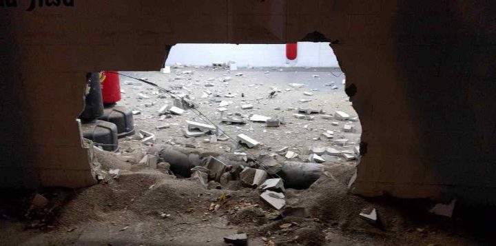 A car punctured a hole in the side of a building in Saskatoon on Saturday evening.