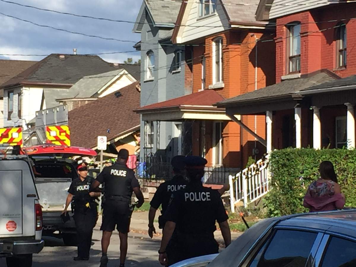 Emergency responders on scene of a house collapse in Hamilton on Oct. 24.