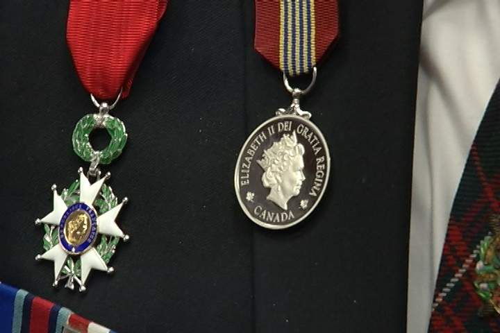 The Sovereign’s Medal for Volunteers (right).