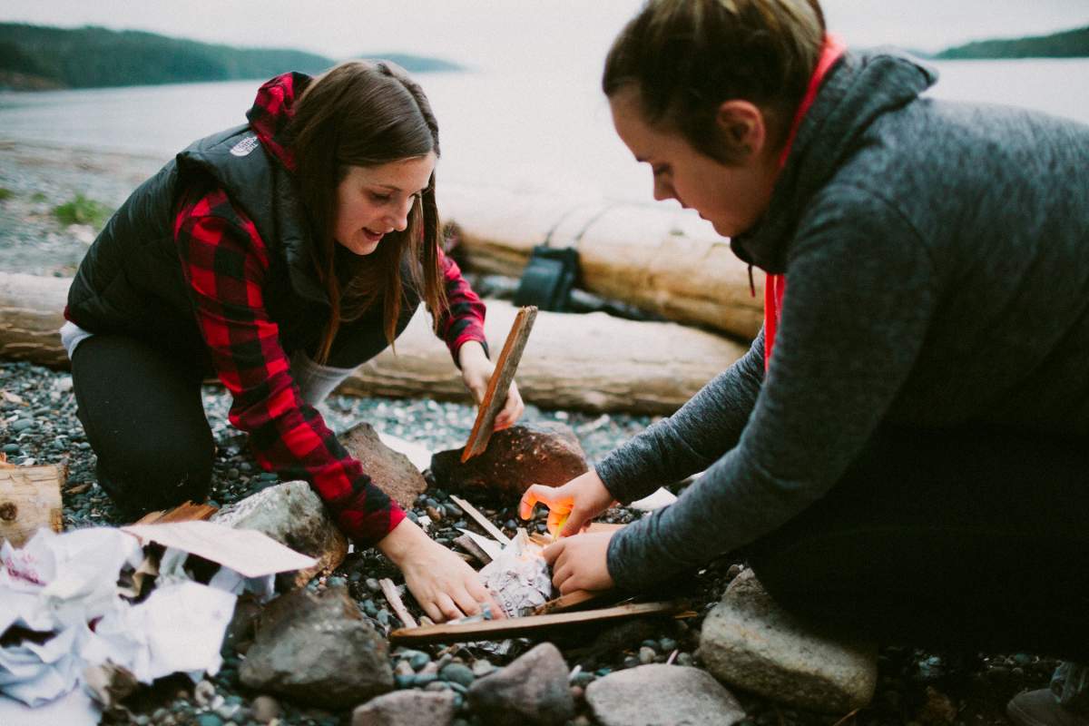 Making a campfire on Storey’s Beach in Port Hardy.