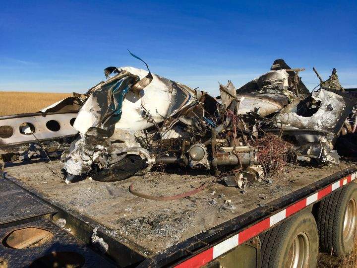 The wreckage of a plane that crashed near the Springbank Airport being put on a truck to go to Edmonton for analysis on Oct. 27, 2017.