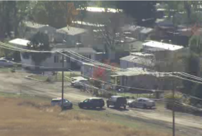 Gunfire exchanged before police arrest man in Kamloops trailer park standoff - image