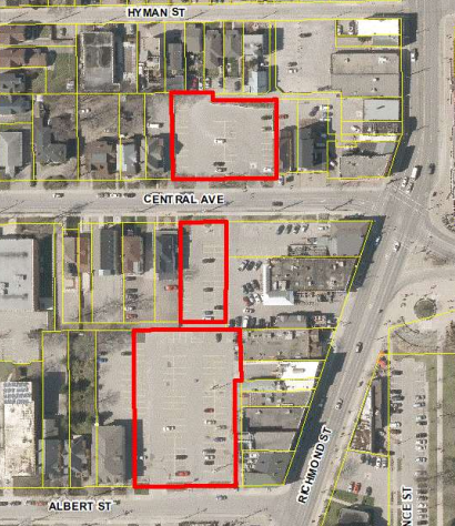 Aerial picture of three surface parking lots up for renewal.