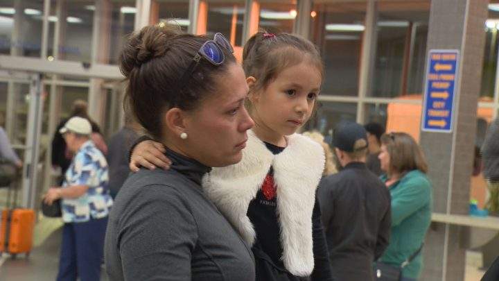 Saskatoon shooting survivors reunite with family after returning home from Las Vegas - image
