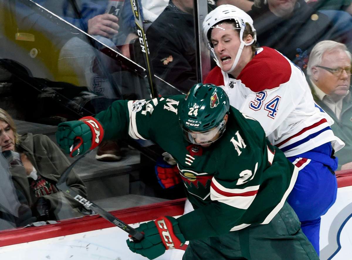 Minnesota Wild defenseman Matt Dumba checks Montreal Canadiens right wing Michael McCarron in 5-1 rout of the Habs.