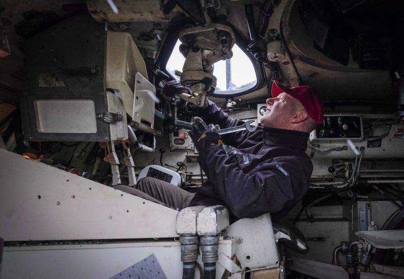 Canadian Forces veteran John Senior works on de-commissioned armoured vehicle as therapy to deal with PTSD at the Military Museums in Calgary, Alta., Wednesday, Oct. 11, 2017.