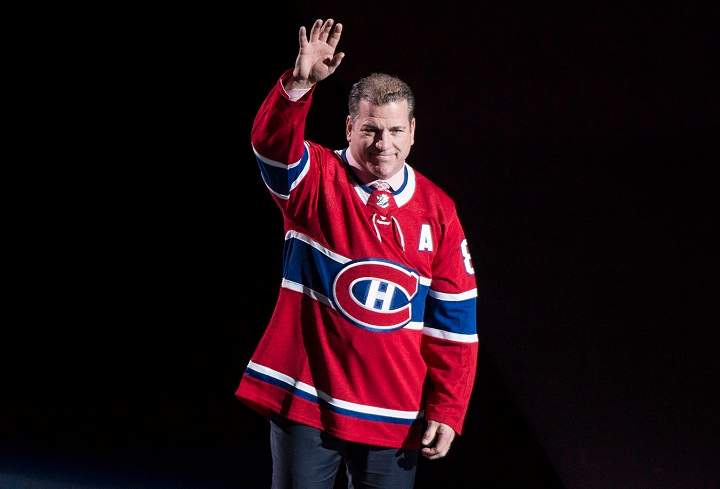 Former Montreal Canadiens player Mark Recchi waves to the crowd as he is introduced ahead of NHL hockey action between the Canadiens and the Ottawa Senators, Wednesday, November 29, 2017 in Montreal. Recchi was recently introduced to the Hockey Hall of Fame. Paul Chiasson/The Canadian Press