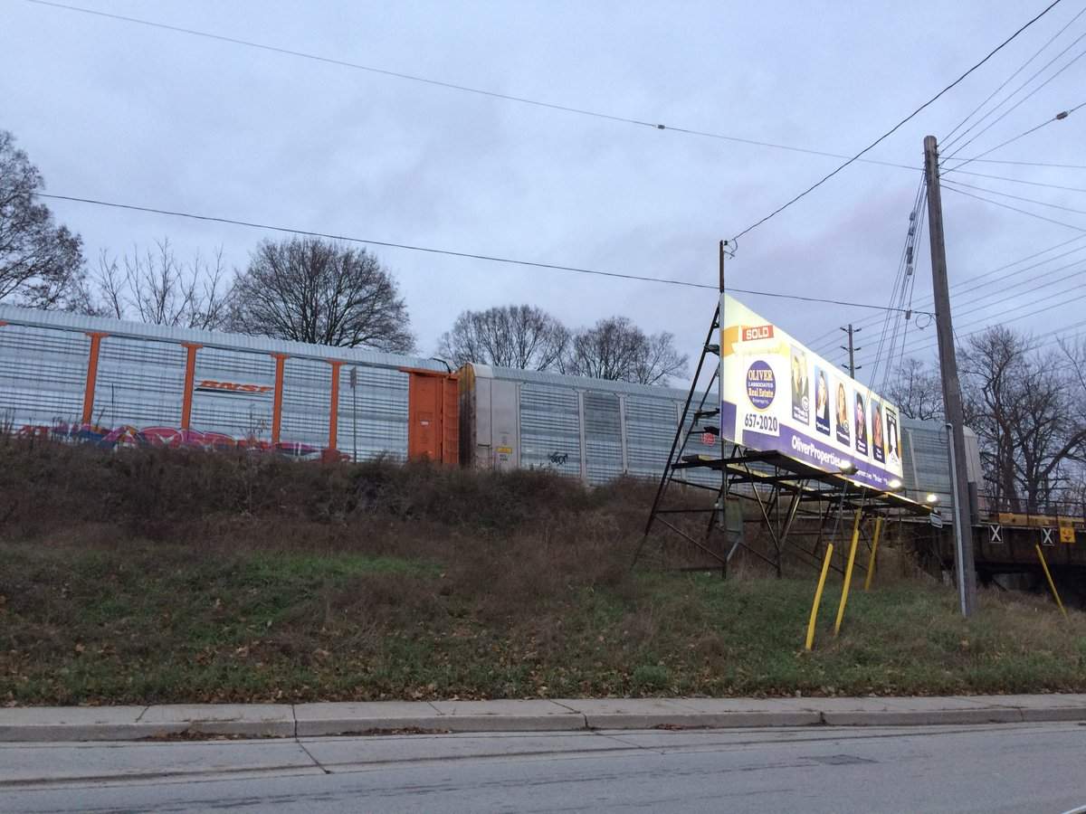 A stopped CN Rail freight train sits on the tracks near Horton and Wharncliffe near where emergency crews say a male was struck.