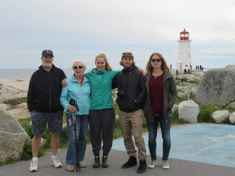 Wyatt Evans, his mother and children pose for a photo at Peggy’s Cove in Halifax. The family’s missing Nikon camera can be seen around his son’s neck.
