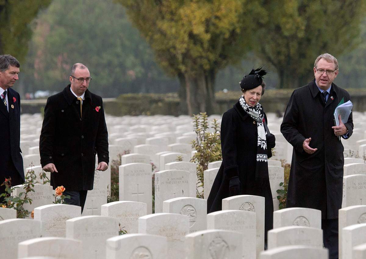 Britain’s Princess Anne, second right, walks past graves at Tyne Cot cemetery in Zonnebeke, Belgium on Saturday, Nov. 11, 2017. Tyne Cot Cemetery is the resting place of 11,954 soldiers of the Commonwealth Forces from the First World War.