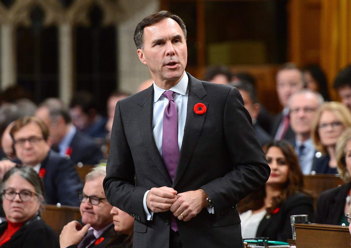 Minister of Finance Bill Morneau stands during question period in the House of Commons on on Parliament Hill in Ottawa on Tuesday Nov. 7, 2017. 