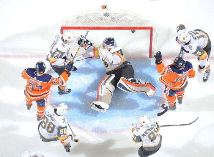 Patrick Maroon #19 and Connor McDavid #97 of the Edmonton Oilers celebrate after scoring a goal on Dylan Ferguson #1 of the Vegas Golden Knights on November 14, 2017 at Rogers Place in Edmonton, Alberta, Canada.