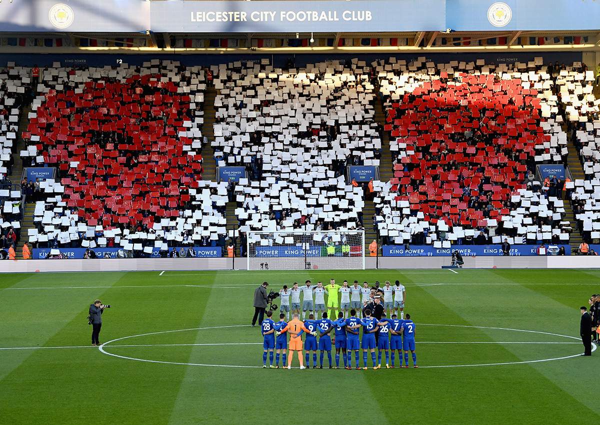 A poppy design is displayed in the crowd as players and officials line up for a minute’s silence ahead of Remembrance Sunday prior to the Premier League match between Leicester City and Everton at The King Power Stadium on Oct. 29, 2017, in Leicester, England.