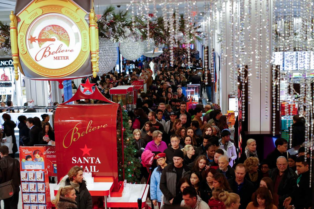 Customers stream into Macy's flagship store in Herald Square on Thanksgiving evening for early Black Friday in New York City.