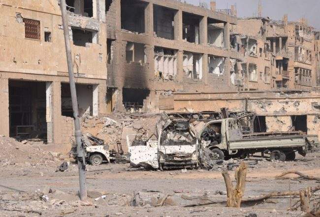 A general view shows damaged buildings in the eastern Syrian city of Deir Ezzor on November 4, 2017.