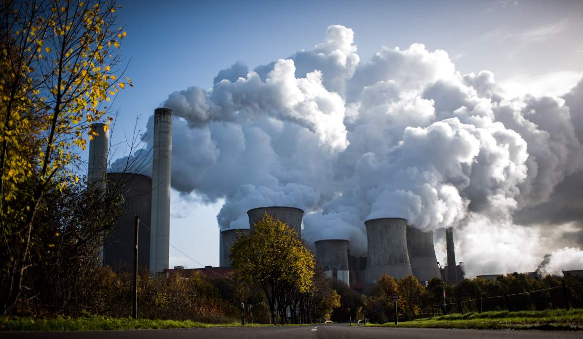 Steam rises from the Niederaussem coal-fired power plant operated by German utility RWE, which stands near open-pit coal mines that feed it with coal, on November 13, 2017 near Bergheim, Germany. 