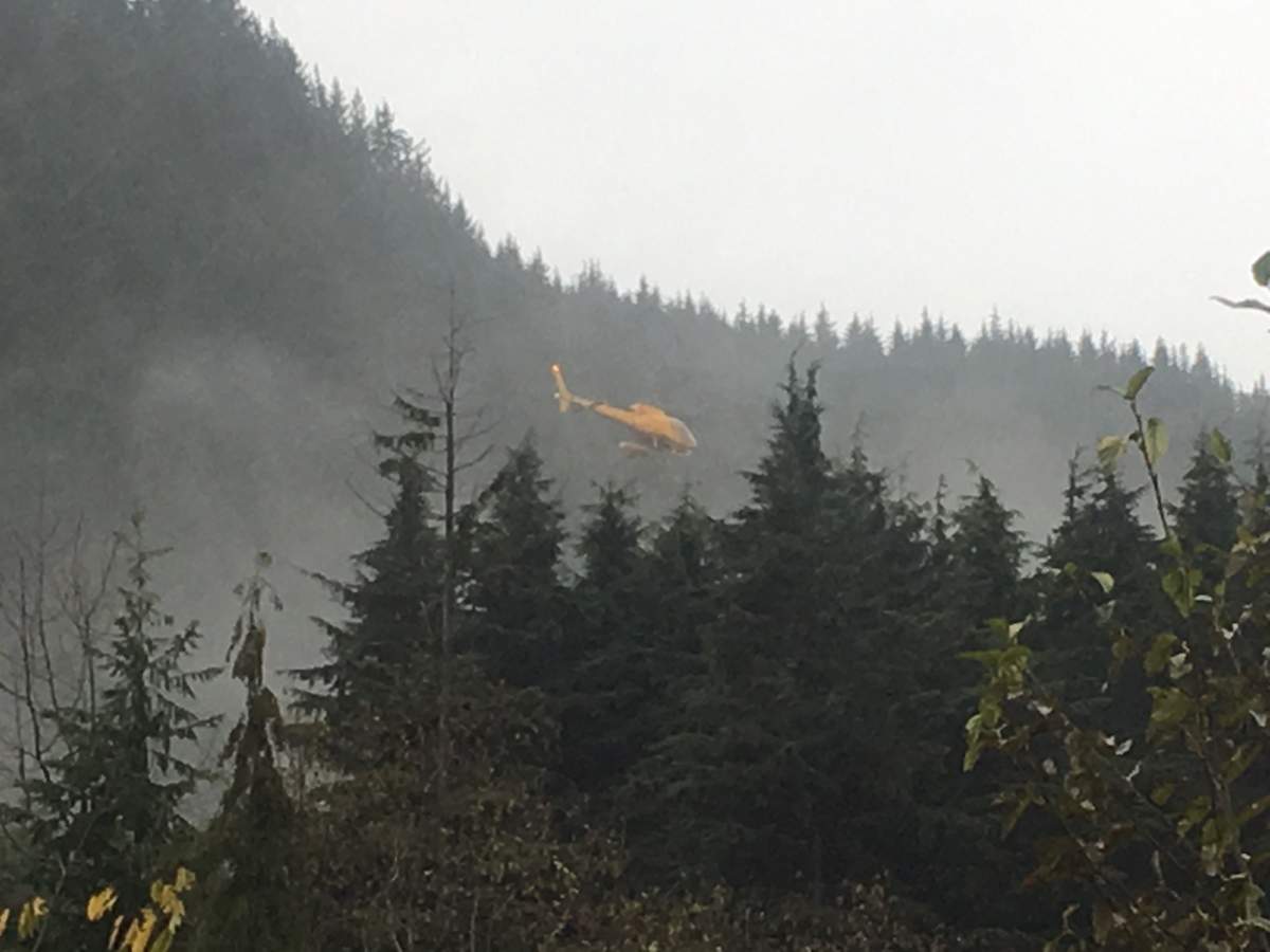 The helicopter taking off to start the search.