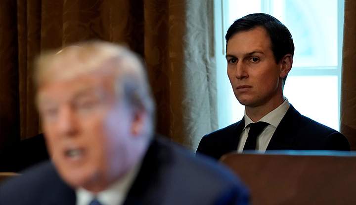 White House Senior adviser Jared Kushner sits behind U.S. President Donald Trump during a cabinet meeting at the White House in Washington, November 1, 2017.  