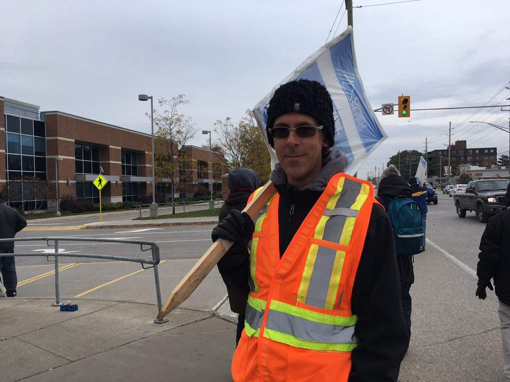 Jeff Miles, a teacher at Fanshawe College, walks the picketlines at Fanshawe College on Nov. 1, 2017.