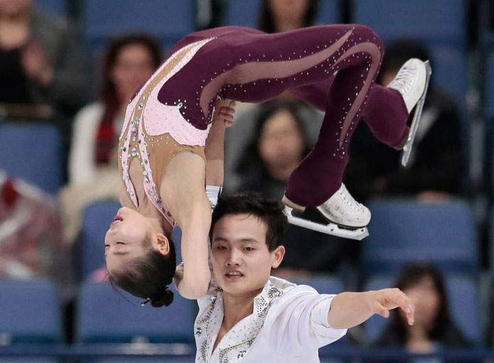 North Korea's Ryom Tae Ok and Kim Ju Sik skate their free program at the World figure skating championships in Helsinki, Finland, on Thursday, March 30, 2017. These two athletes will travel to the Olympics in February.