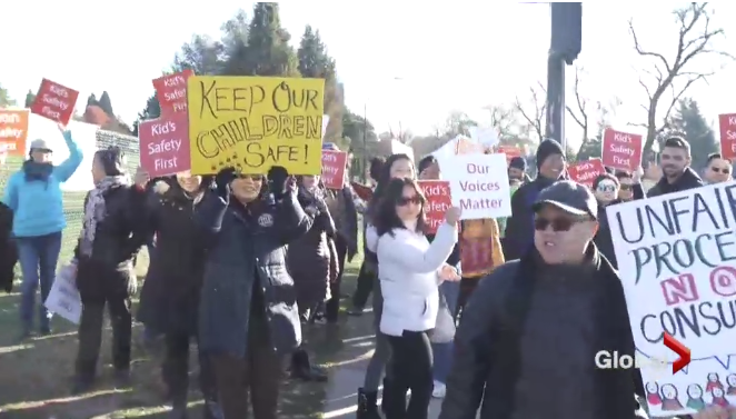 Protesters outside the proposed site of modular housing near three Vancouver schools say it would bring drugs and crime to the neighbourhood.