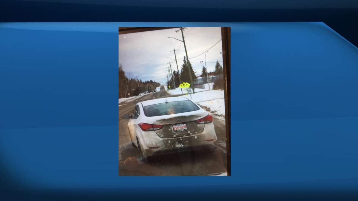 One of the suspects reportedly fled the scene in this vehicle. The plate was stolen from a car in Edmonton.