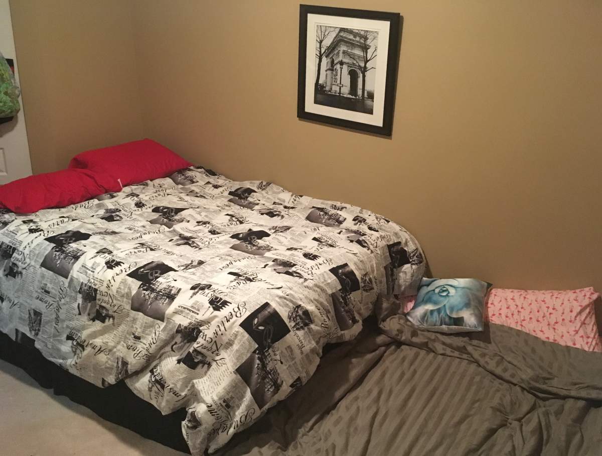 Laura and Chris’ bedroom in her mother’s basement.