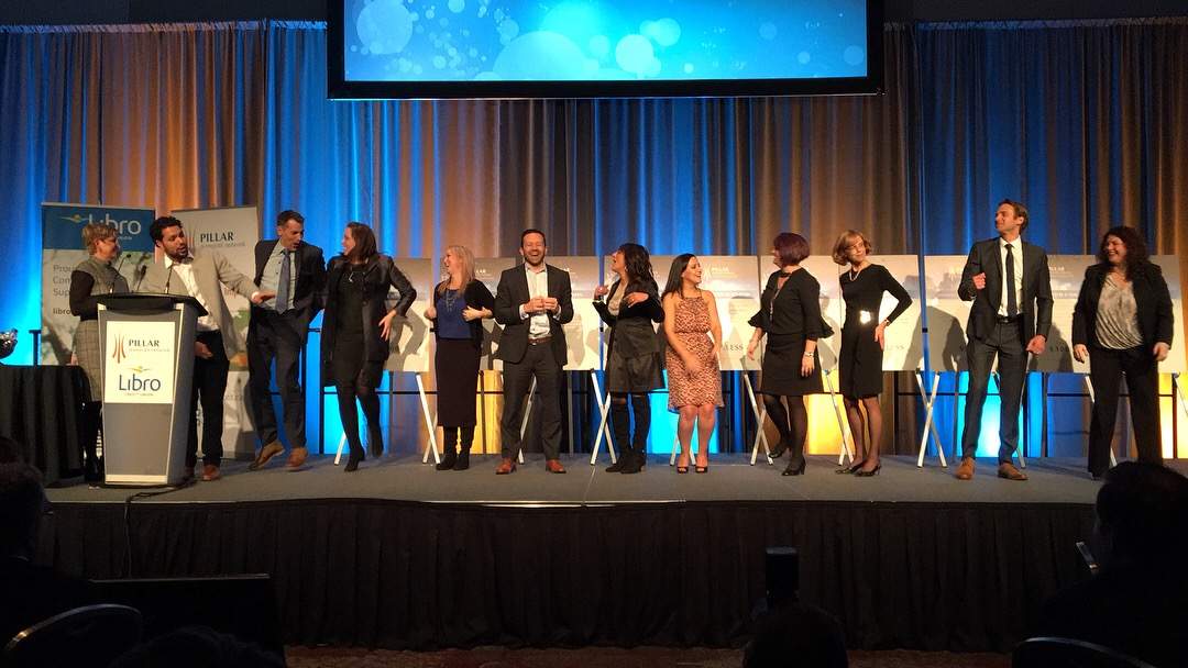 Attendees take part in the boisterous Heads or Tails fundraiser at the 11th annual Pillar Community Innovation Awards.