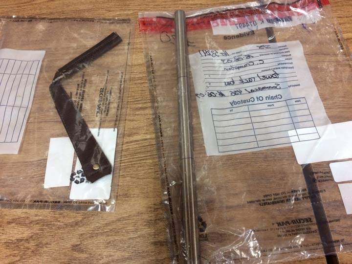 This is an image of the strap of leather used to kill Cynthia Crampton and a towel bar pulled from the bathroom wall to assist in the murder.