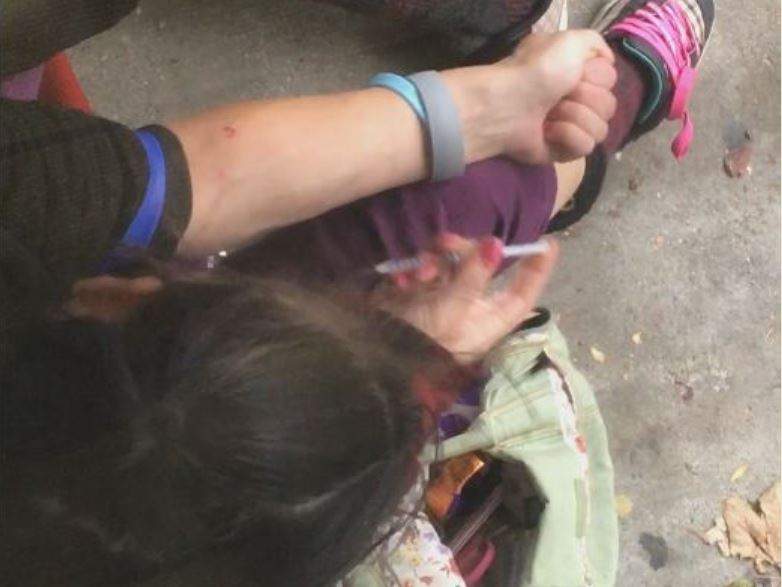 An intravenous drug user in a downtown Kelowna doorway.