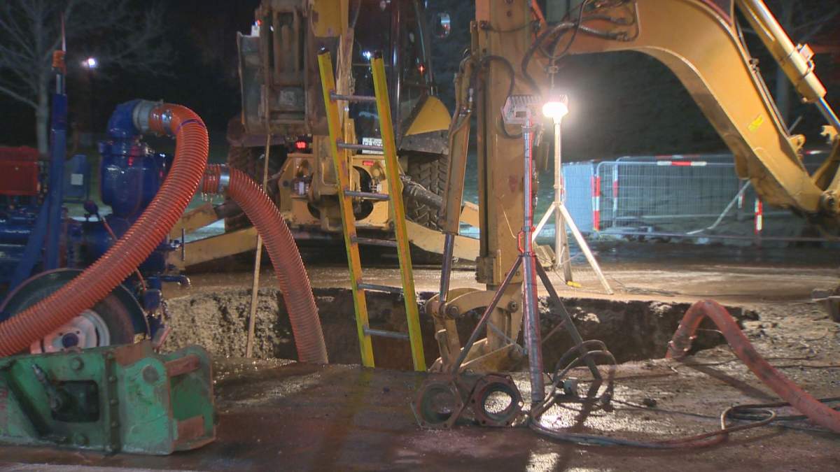 Borough workers race to repair broken water main. 