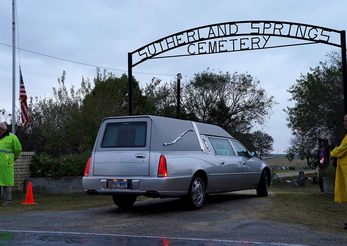 One of two hearses arrives at the cemetery for the burial of Richard and Therese Rodriguez after the husband and wife were killed in the shooting at First Baptist Church of Sutherland Springs, Texas, U.S. November 11, 2017.