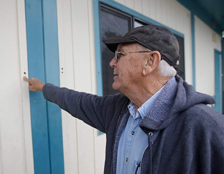 Randy Morehouse, the maintenance and operations supervisor for the Corning Union Elementary School District, points to one of the bullet holes at the Rancho Tehama Elementary School, Wednesday, Nov. 15, 2017, from gunman Kevin Janson Neal’s shooting rampage.