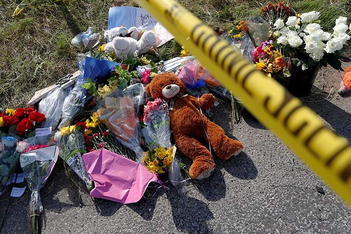 A memorial is seen at the site of the shooting at the First Baptist Church of Sutherland Springs, Texas, November 7, 2017.