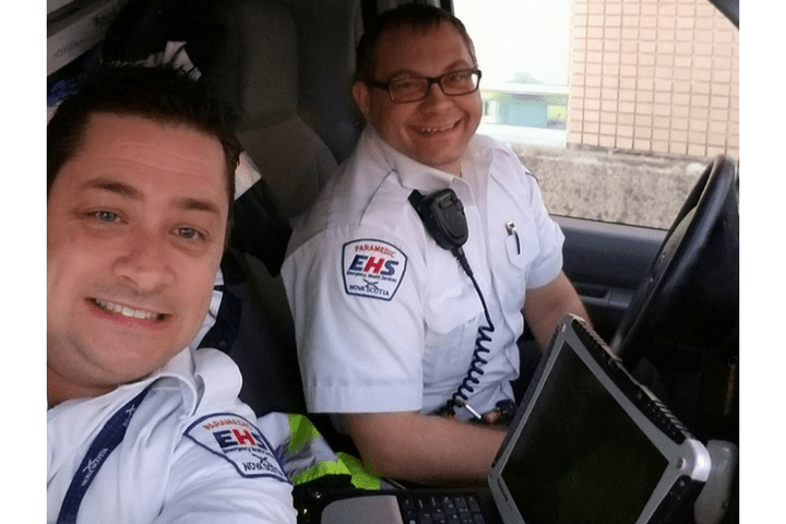 Kevin Davison (left) with a coworker.