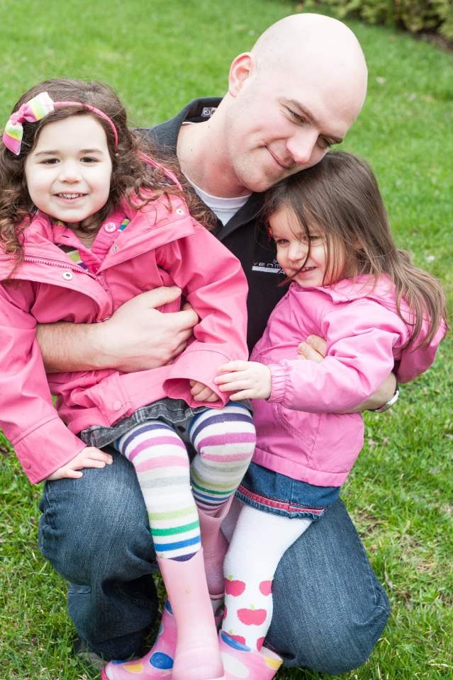Forman with his two daughters.