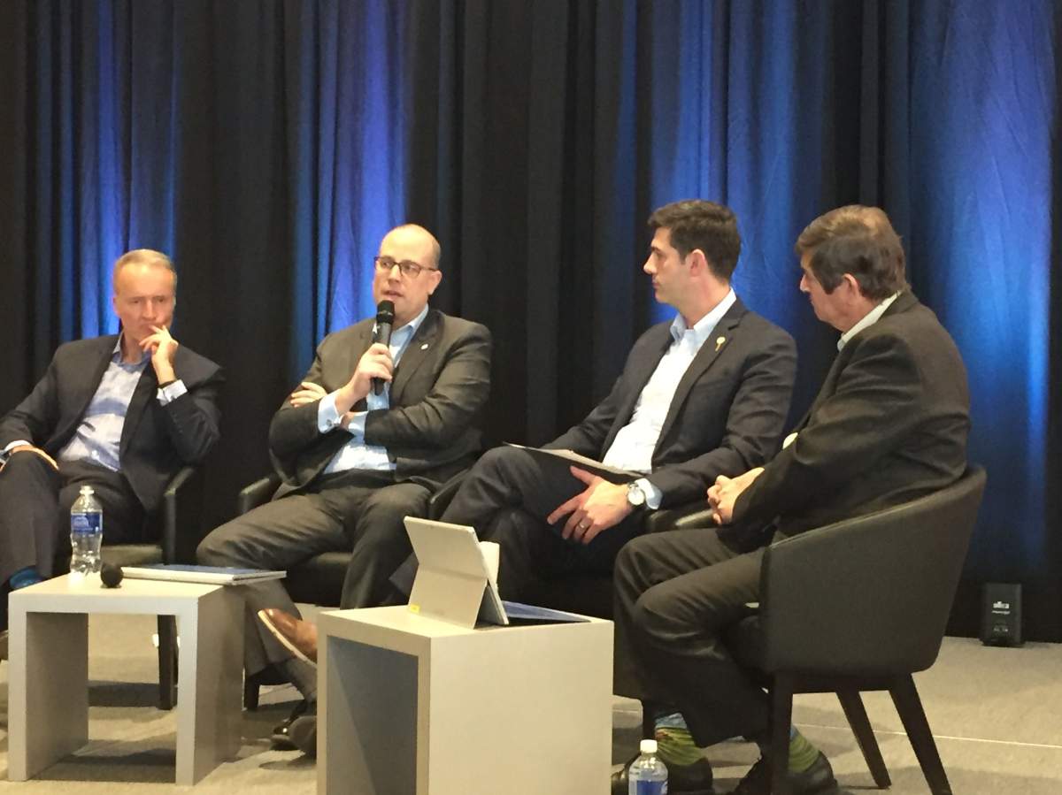 Ed Sims of WestJet, Cameron Schuler from the Alberta Machine Intelligence Institute, Mayor Don Iveson and EIA CEO Tom Ruth at a forum in Edmonton on Monday, Dec. 11, 2017.