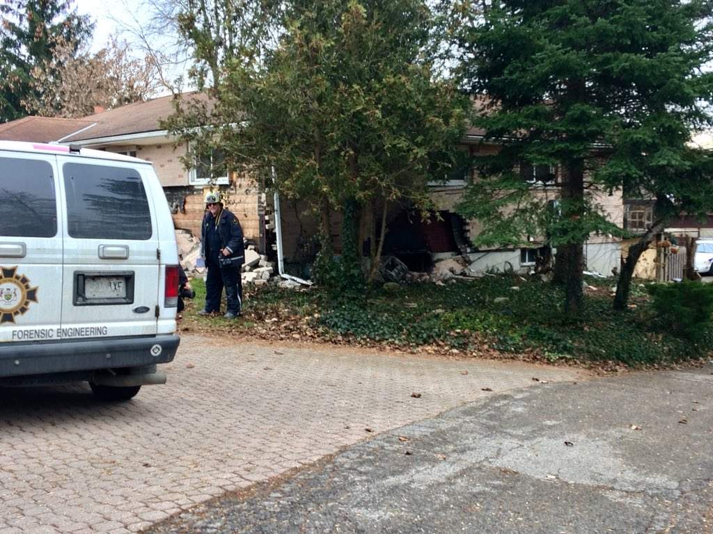 Ontario Fire Marshal's Office investigator, Clive Hubbard, studies the wreckage of a home explosion on Hamilton Rd on Tuesday, Dec 5th.