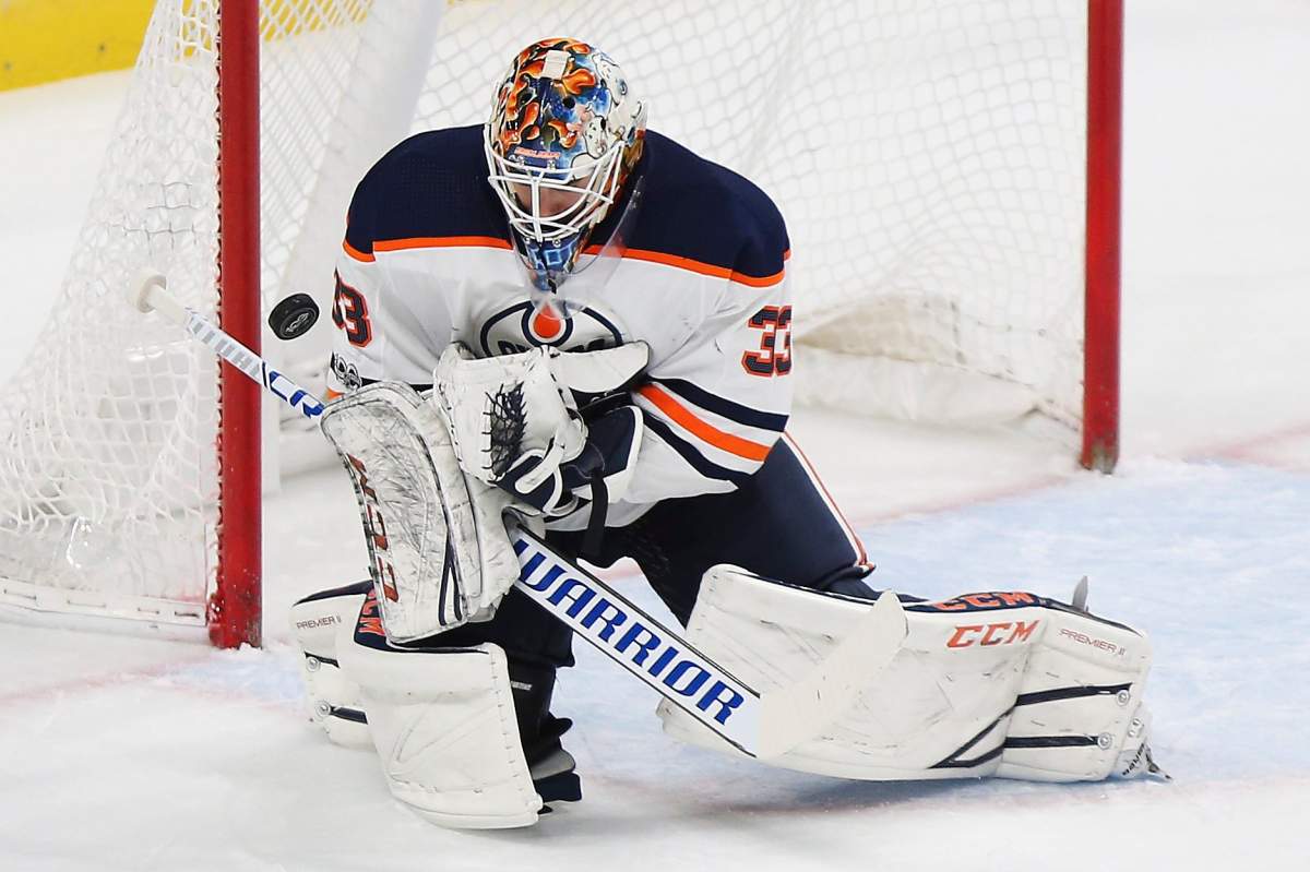 Edmonton Oilers' goalie Cam Talbot (33) blocks a goal attempt by the Minnesota Wild in the first period of an NHL hockey game Saturday, Dec. 16, 2017, in St. Paul, Minn. (AP Photo/Stacy Bengs).