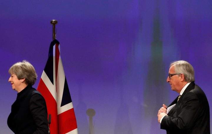 Britain's Prime Minister Theresa May and Jean-Claude Juncker, President of the European Commission leave after making statements at the Commission in Brussels, Belgium, Dec. 4, 2017.