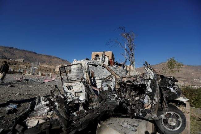 The wreckage of a vehicle is pictured at the site of air strikes in Sanaa, Yemen December 26, 2017. 