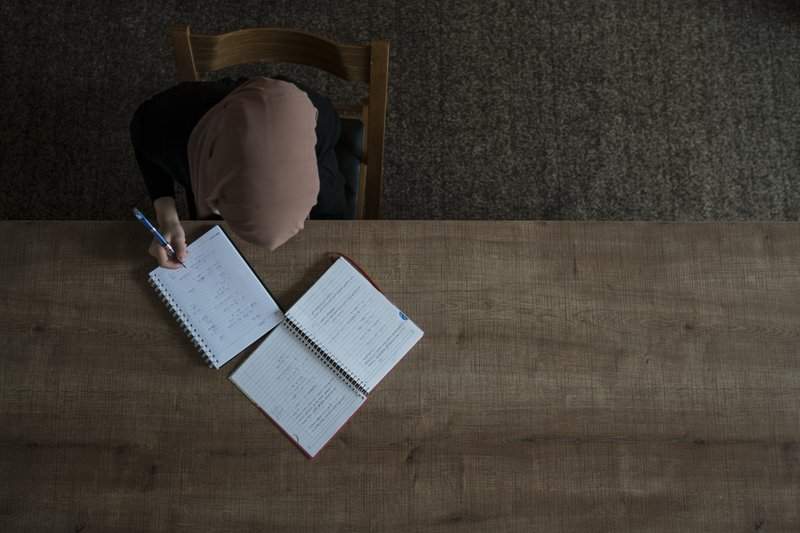 Ferah studies for an exam in Irbil, Iraq, in this photo taken Nov. 11, 2017.